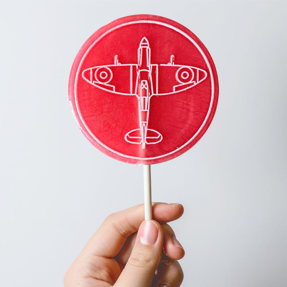 Spitfire design strawberry flavour candy hard boiled lollipop.