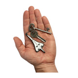 Concorde rubber PVC Keyring attached to keys on human hand.