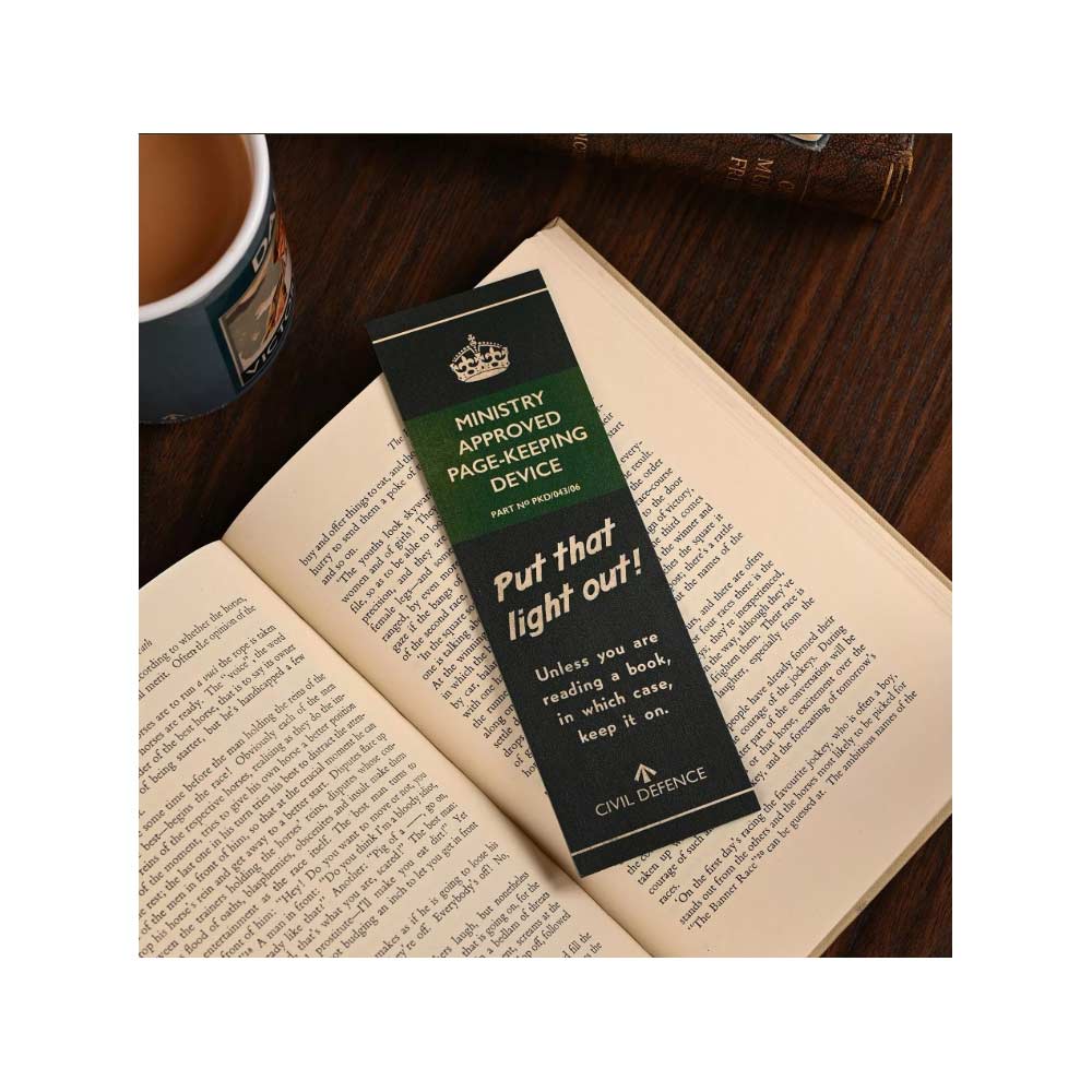 Civil Defence green bookmark with slogan text Ministry Approved Page Keeping Device and put that light out!