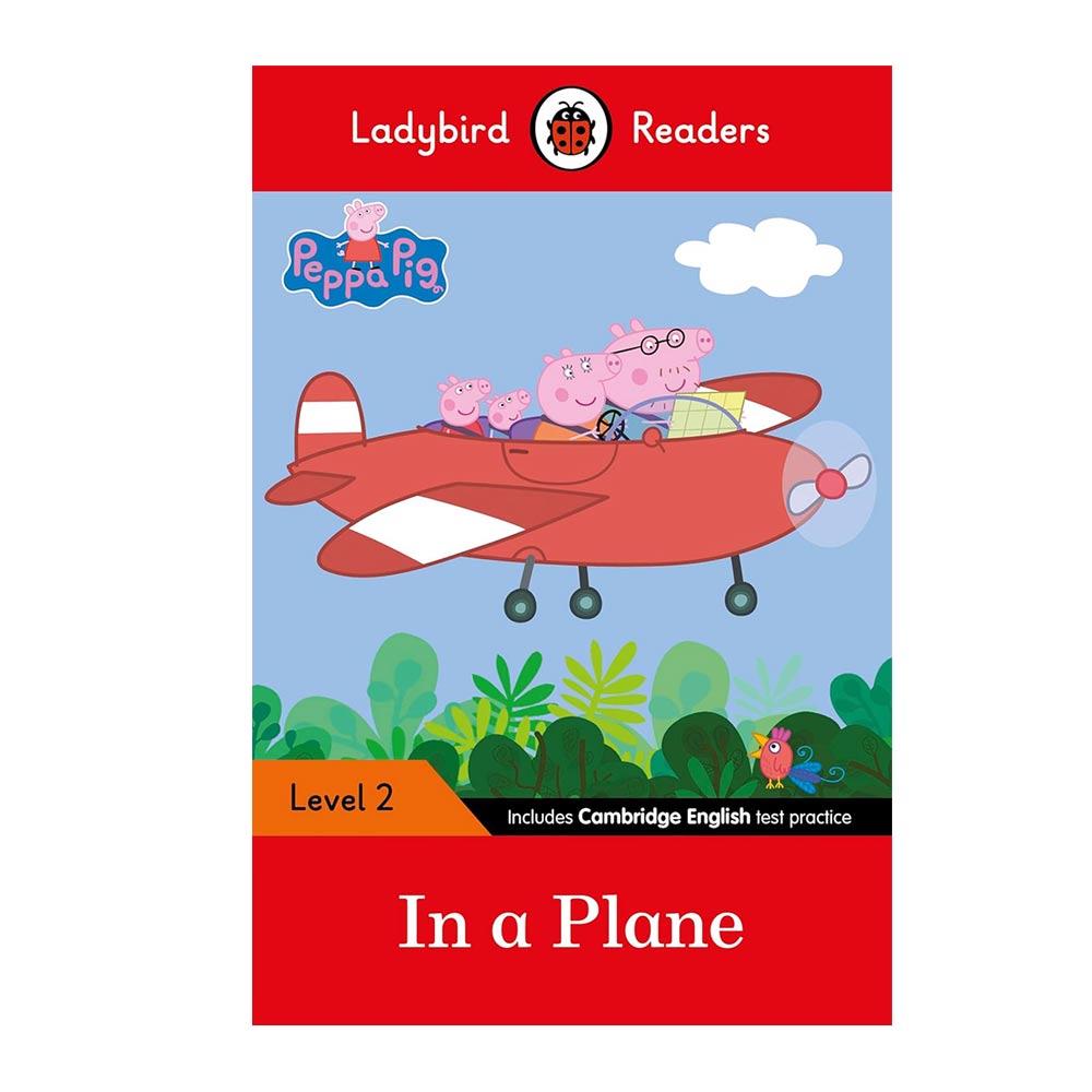 Book cover of 'In a Plane' from Ladybird Readers featuring Peppa Pig and her family in an airplane.