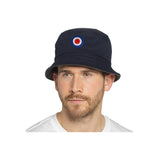 Man wearing a black bucket hat with a Roundel embroidered logo.
