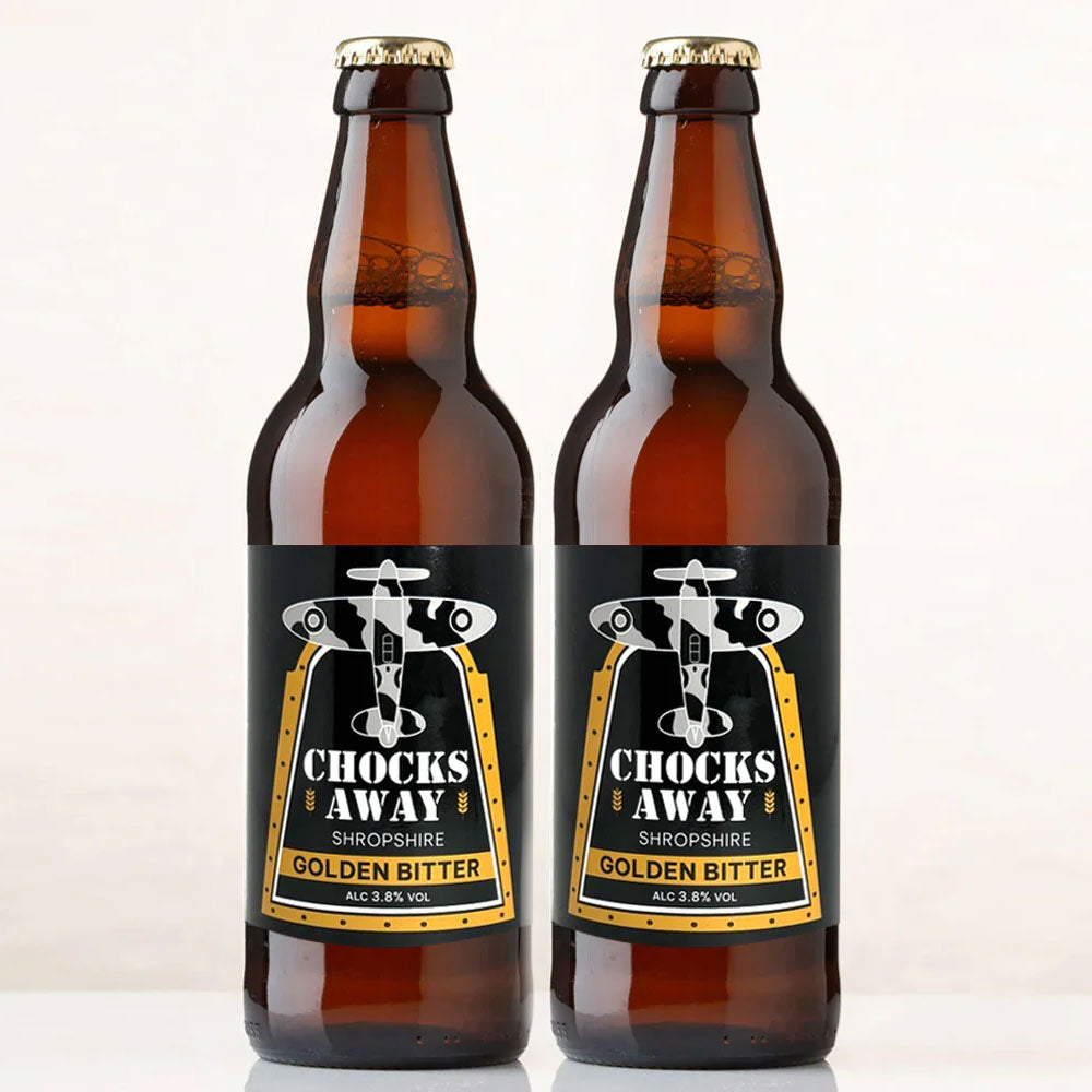 Two bottles of Chocks Away Golden Bitter Beer, featuring a Spitfire design.