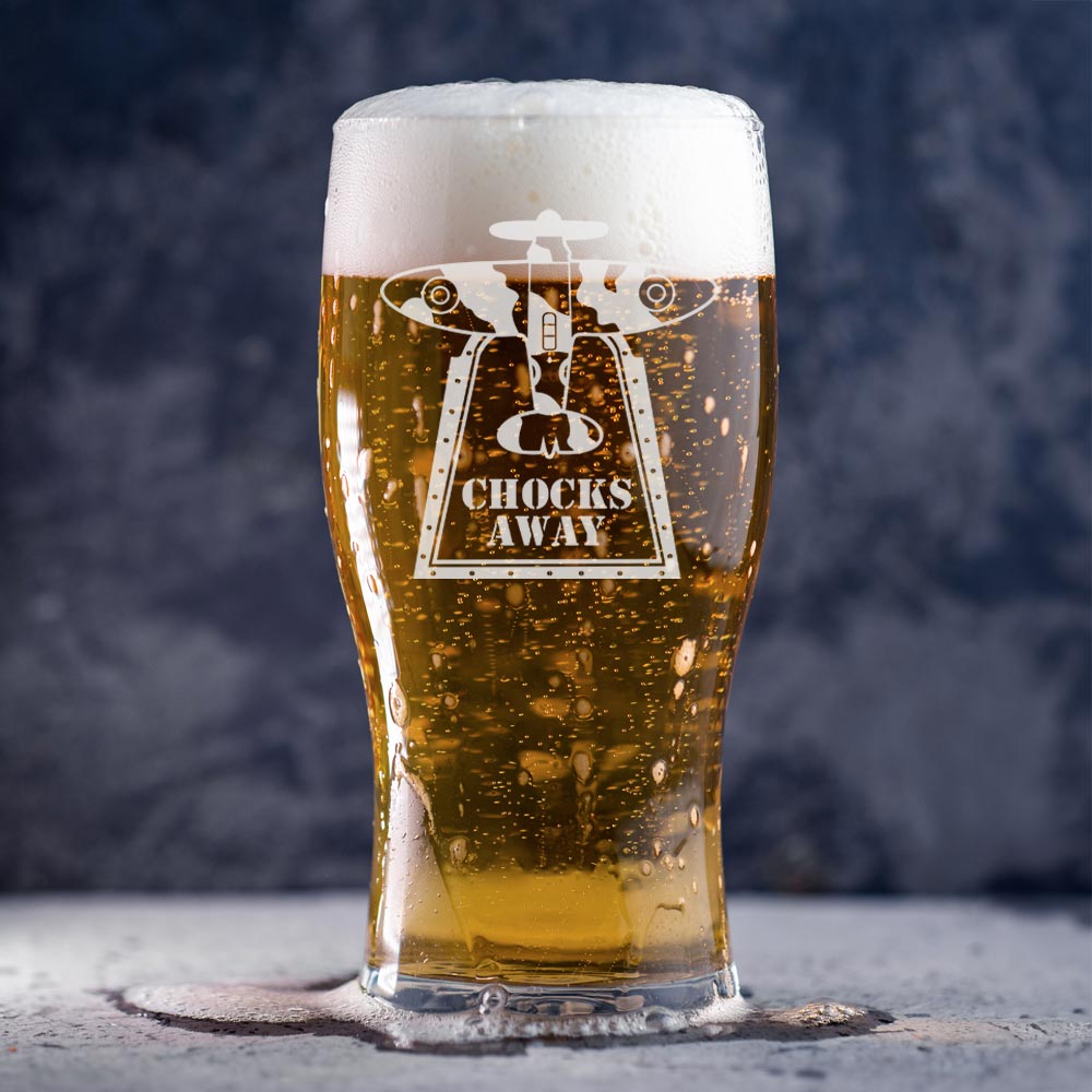 568ml tulip shape pint glass features the Chocks Away Spitfire design on both sides, with the Royal Air Force museum logo discreetly placed on the side of the glass.