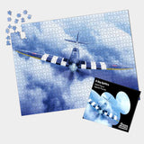 Exclusive to the Royal Air Force Museum. 1,000 piece D-Day Spitfire Jigsaw Puzzle featuring a Spitfire aircraft flying above the clouds.