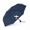 Navy blue folding umbrella featuring a white Spitfire silhouette, with a compact black handle and wrist strap.