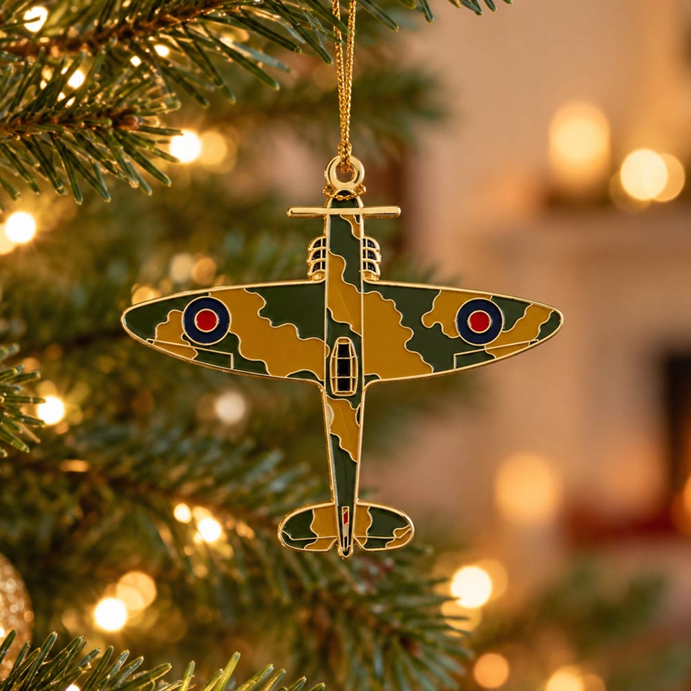Spitfire Christmas hanging decoration with green and ochre camouflage, RAF roundels, gold edging and a gold hanging cord.