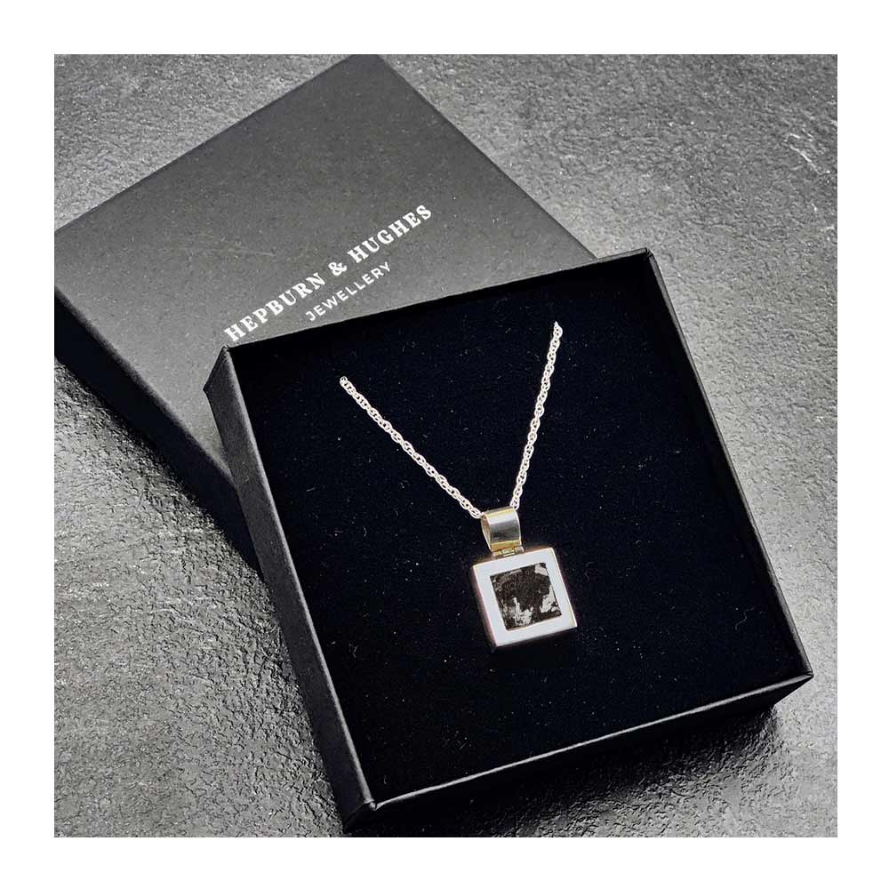 Genuine authentic fuselage metal reclaimed from the historic Avro Lancaster Bomber DV345, made into a square pendant 15mm x 15mm on 18 inch chain. In a black gift box.