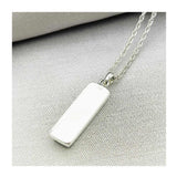 Back of Red Arrows Hawk rectangle pendant crafted from original section of the aircraft's rudder. On 18" Silver chain.
