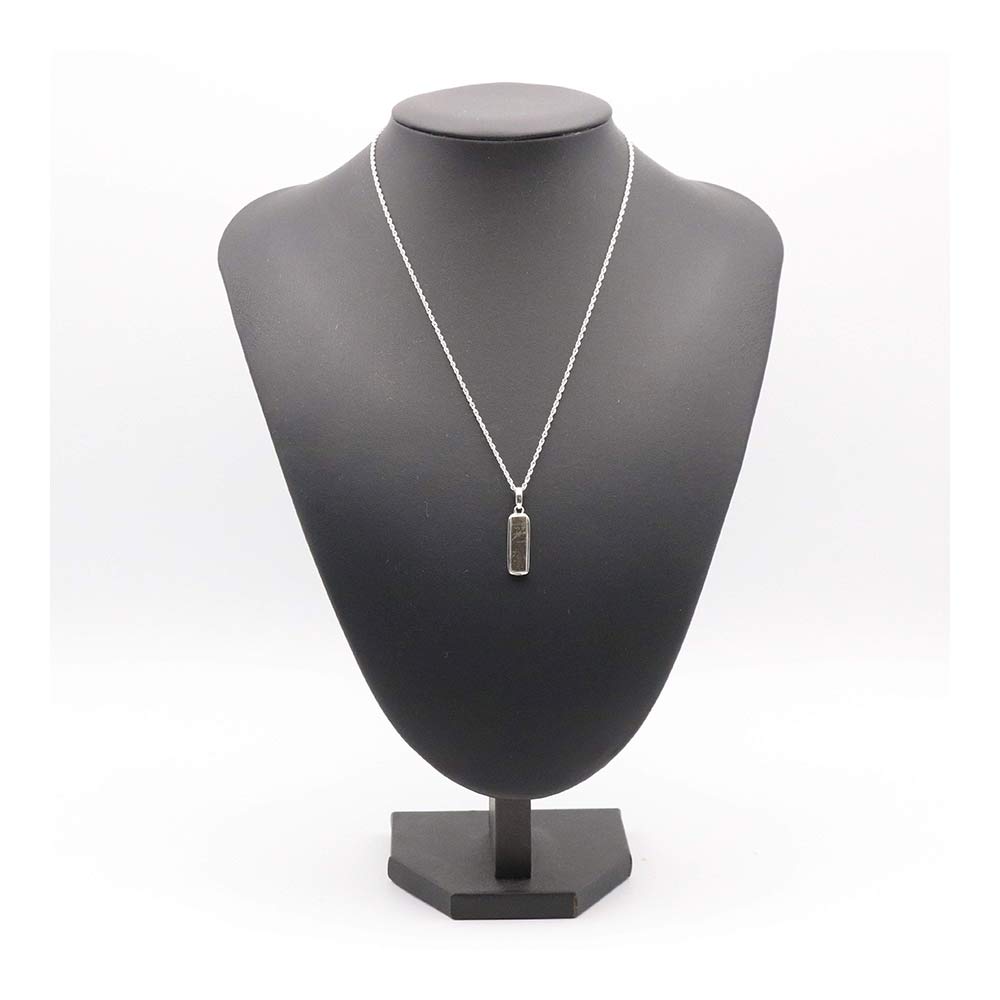 Spitfire pendant Rectangle shape on a 18" silver chain displayed on a mannequin bust. 