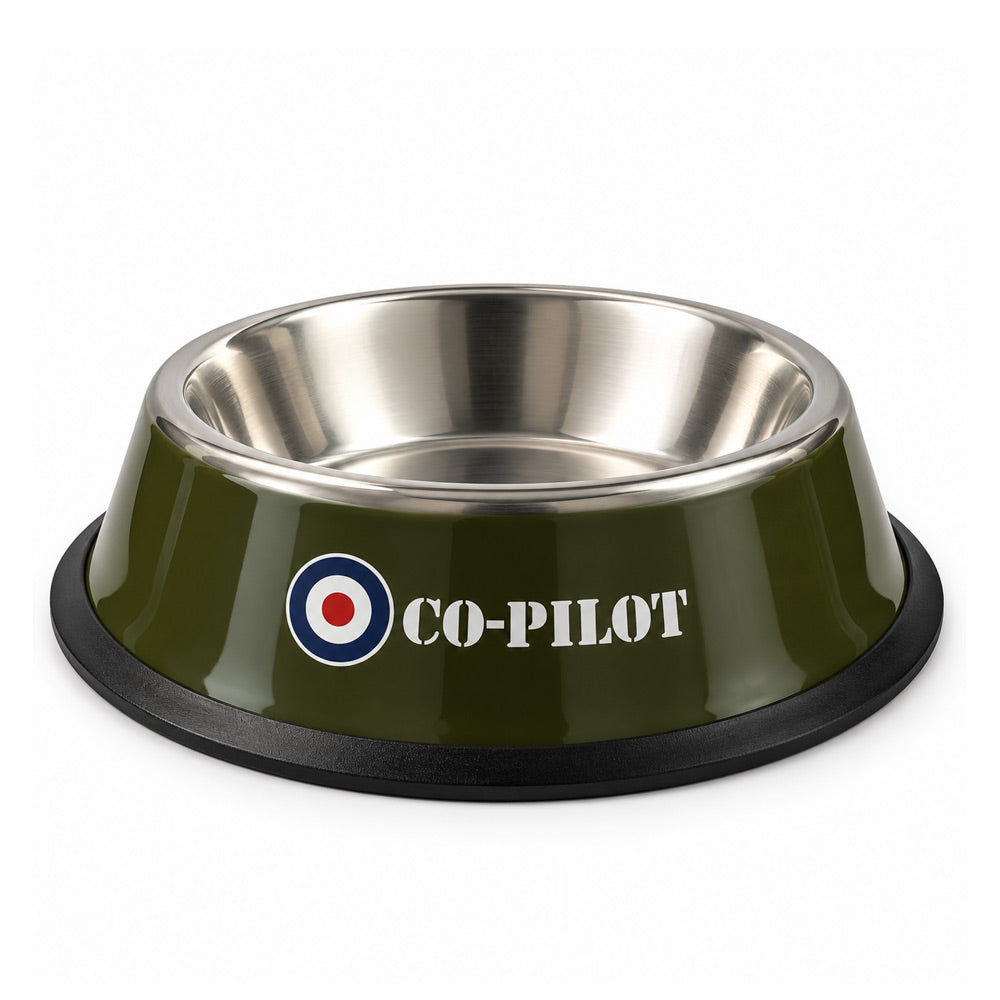 Military olive-green pet bowl with stainless steel interior, black non-slip rubber base, white CO-PILOT lettering, RAF roundel and Royal Air Force Museum logo.