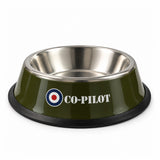 Military olive-green pet bowl with stainless steel interior, black non-slip rubber base, white CO-PILOT lettering, RAF roundel and Royal Air Force Museum logo.