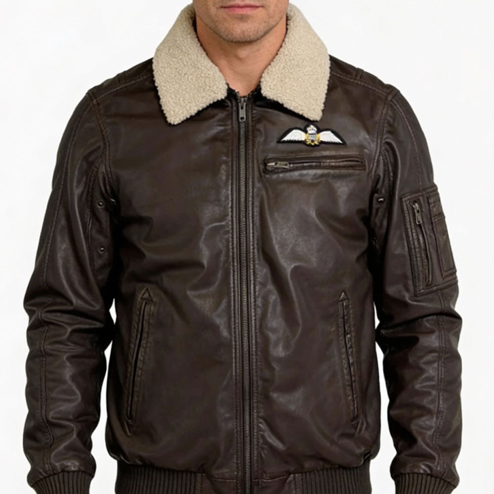 Royal Air Force Museum aviator jacket in heavy brown waxed leather, with detachable fleece collar, embroidered RAF Wings badge on left chest, and multiple zip pockets on sides, chest, and sleeve.