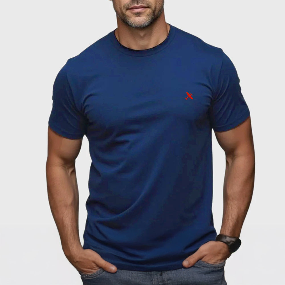A classic navy crew neck t-shirt, featuring a simple red Spitfire embroidery on the left chest.
Made exclusively for the RAF Museum.