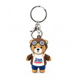 3D PVC pilot bear keyring wearing a brown flying jacket, helmet and goggles, with blue trousers and an RAF Museum logo on its white top.