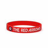 A red children's silicon wristband featuring Red Arrows wording.