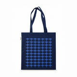 Navy recycled cotton tote bag with long handles, featuring a repeated blue Spitfire silhouette pattern across the front.