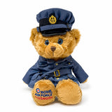 A cute bear dressed in a classic Women’s Auxiliary Air Force-inspired uniform, made of soft plush fabric. The bear wears a smart blue WAAF uniform coat, matching cap, and carries a handbag.